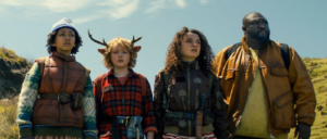 Wendy, Gus, Becky, and Big Man standing next to each other, standing in a field in the series finale of Sweet Tooth